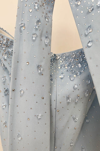 Crystal-Embellished Strapless Gown – Statement Neckline & Flowing Back Cape