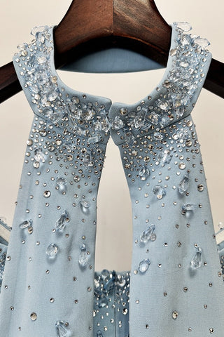 Crystal-Embellished Strapless Gown – Statement Neckline & Flowing Back Cape