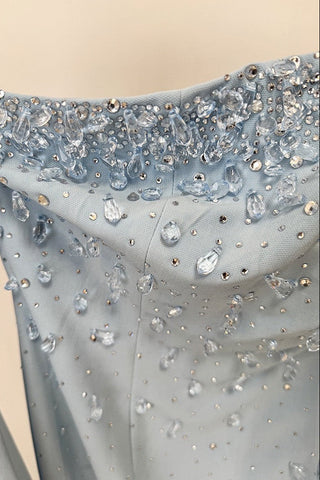 Crystal-Embellished Strapless Gown – Statement Neckline & Flowing Back Cape