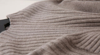 Ribbed Knit Two-Piece Set – Oversized Sweater with Button-Cuff Sleeves & High-Waist Midi Skirt