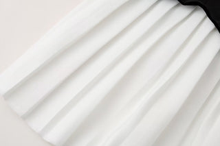 Black and White Contrast Pleated Hem Dress