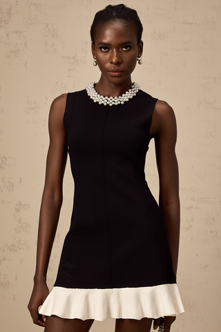 Sleeveless Black Mini Dress with Pearl Neckline and Ruffle Hem