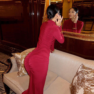 Elegant Red Long-Sleeve Evening Dress with Shoulder Pads and Ruched Hip Detail - Fishtail Maxi Gown